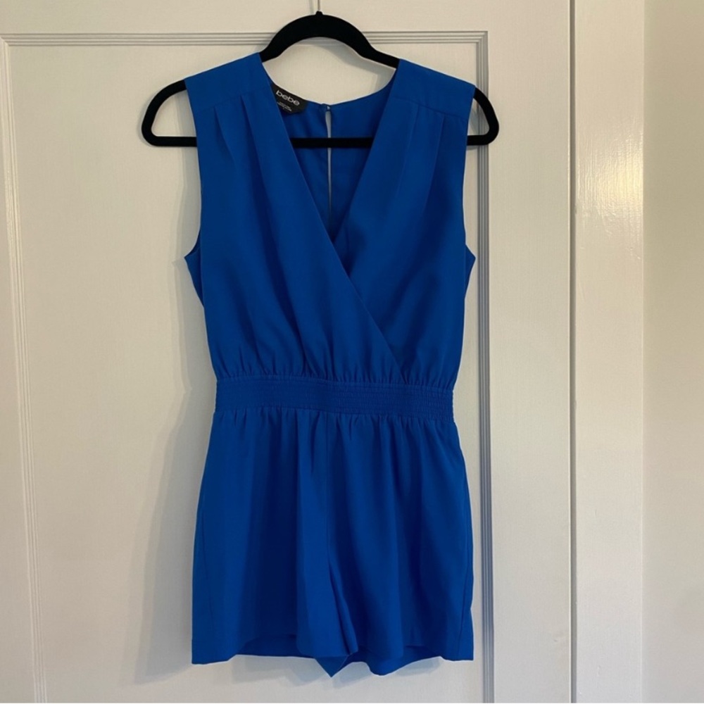Woman’s Beautiful Bebe royal blue Romper